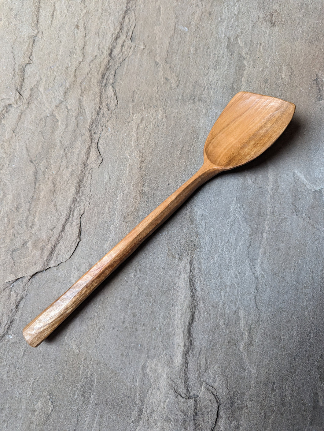 Asymmetrical cooking spoon